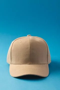 Cream baseball cap and copy space on blue background イラスト素材