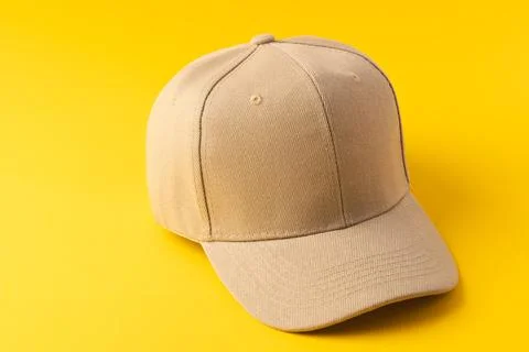 Cream baseball cap and copy space on yellow background イラスト素材