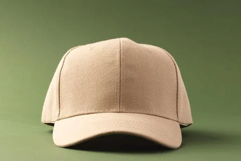 Cream baseball cap and copy space on green background イラスト素材