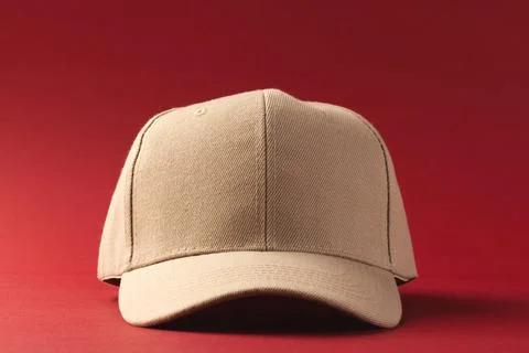 Cream baseball cap and copy space on red background イラスト素材