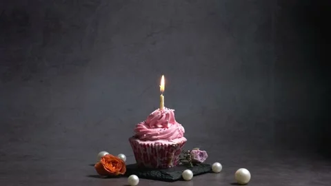 Cream cake with lit candle Stock Footage 223671531