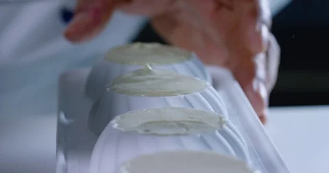 Cream in a Cake Pan Decorated 4K Stock Footage 79263419