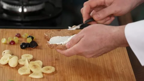 Cream cheese on bread Stock Footage 183506110