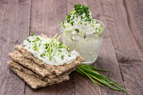 Cream cheese on crispbread Stock Photos