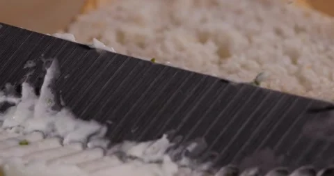 Cream cheese spread on a slice of bread. Stock Footage 264157282