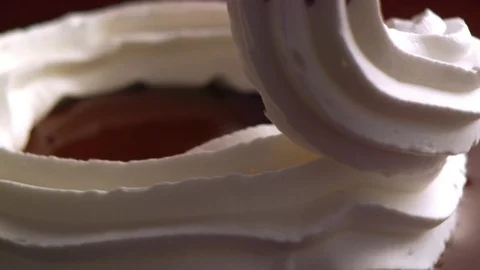   Cream on chocolate surface turning Video stock 81805956
