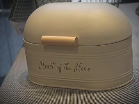 Cream-colored Kuchenland bread bin Stock Photos