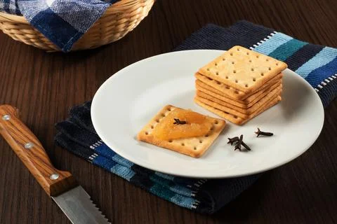Cream cracker biscuit with apple jam Stock Photos