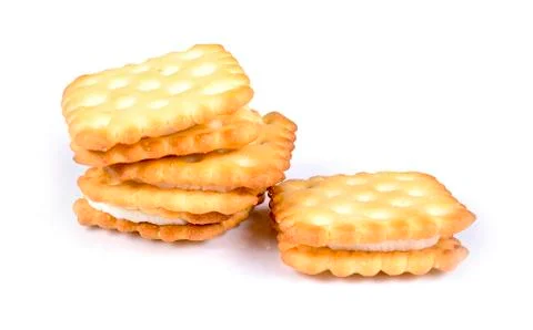 Cream cracker biscuits on white background. Stock Photos
