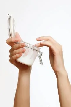 Cream in hand Foto stock