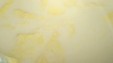 The cream layer formed on the cooked milk, 스톡 동영상 154245438