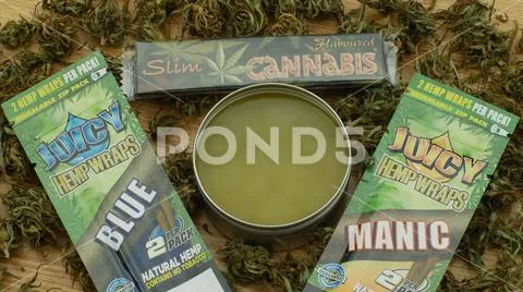 Cream medicinal cannabis hemp and cigarette papers wraps for smoking Stock Photos
