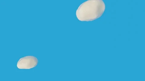 Cream milk splash drops liquid bg super slow motion 1000 FPS Stock Footage 338172771