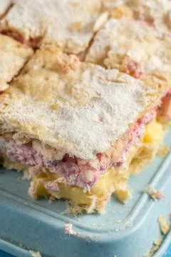 Cream pie with raspberry closeup macro on the natural daylight Stock Photos