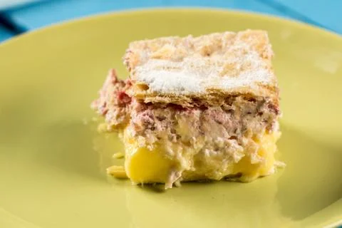 Cream pie with raspberry on the plate in natural light Stock Photos