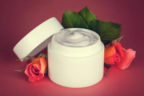Cream with roses Stock Photos