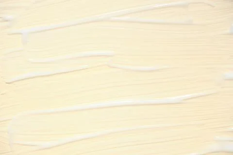 Cream texture on colored background Stock Photos