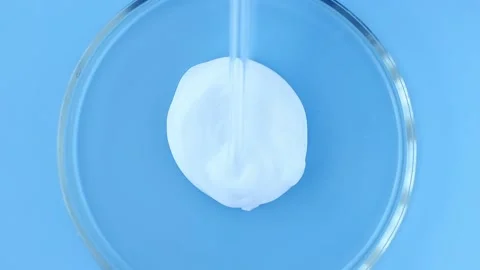 Cream texture cosmetic sample in a Petri dish Stock Footage 196690129