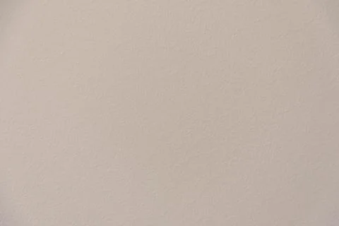 Cream wall texture background. Close-up, pastel colors. Foto stock