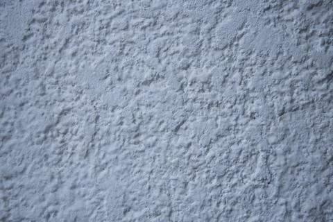 Cream wall texture background. Close-up, pastel colors. Stock Photos