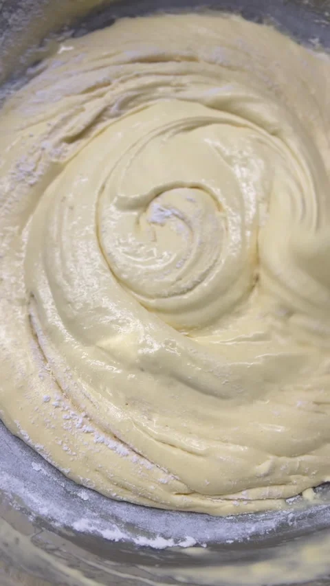 The Creamy Batter Mixing Process Essential for Successful Baking and Delicious Stock Footage 306077732