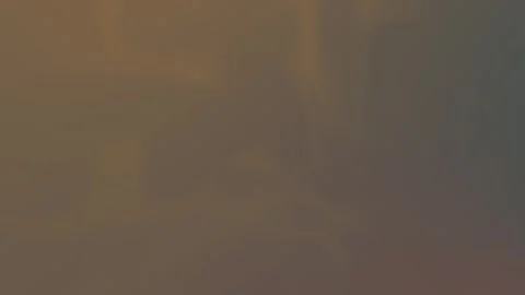 Creamy beige gradient with subtle light streaks and soft curves. Seamless loop Stockbeeldmateriaal 309956829