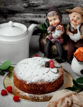 Creamy cake with berries on the table Stock Photos