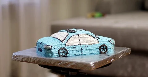 Creamy cake in the shape of the car. Stock Footage 78590773