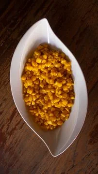 Creamy Corn Kernels in Elegant White Bowl, Restaurant Snack Menu Stock Photos