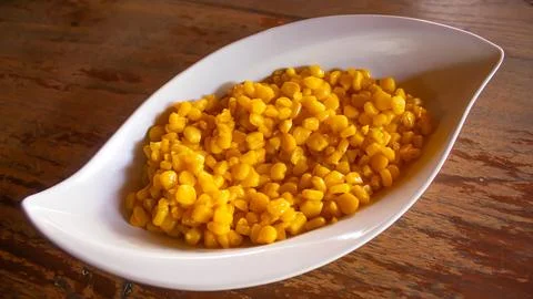 Creamy Corn Kernels in Elegant White Bowl, Restaurant Snack Menu Stock Photos