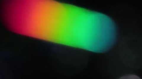 Create abstract bokeh light leak ring and horizontal colored light from above in Vidéo 317537578