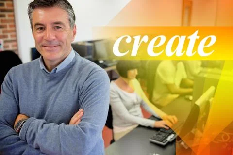 Create against teacher smiling at top of computer class Stock Photos