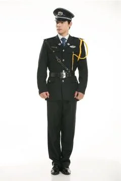 Create all kinds of work clothes policeman stands in front of a white background Stock Photos