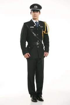 Create all kinds of work clothes policeman stands in front of a white background Stock Photos