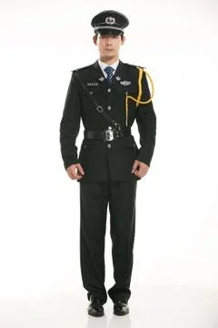 Create all kinds of work clothes policeman stands in front of a white background Stock Photos