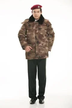 Create all kinds of work clothes policeman stands in front of a white background Stock Photos