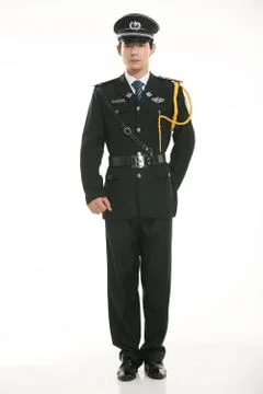 Create all kinds of work clothes policeman stands in front of a white background Stock Photos