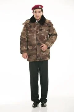 Create all kinds of work clothes policeman stands in front of a white background Stock Photos