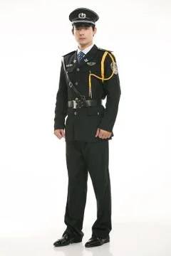 Create all kinds of work clothes policeman stands in front of a white background Stock Photos