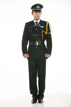 Create all kinds of work clothes policeman stands in front of a white background Stock Photos