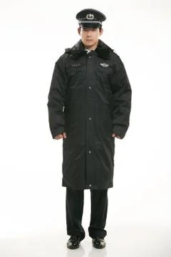 Create all kinds of work clothes policeman stands in front of a white background Stock Photos