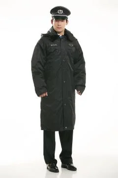 Create all kinds of work clothes policeman stands in front of a white background Stock Photos