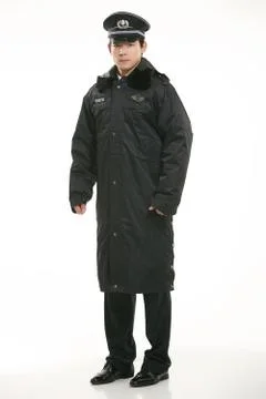 Create all kinds of work clothes policeman stands in front of a white background Stock Photos