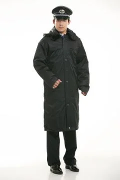 Create all kinds of work clothes policeman stands in front of a white background Stock Photos