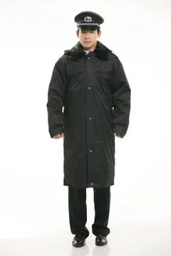 Create all kinds of work clothes policeman stands in front of a white background Stock Photos