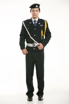 Create all kinds of work clothes policeman stands in front of a white background Stock Photos