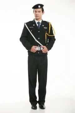 Create all kinds of work clothes policeman stands in front of a white background Stock Photos