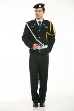 Create all kinds of work clothes policeman stands in front of a white background Stock Photos