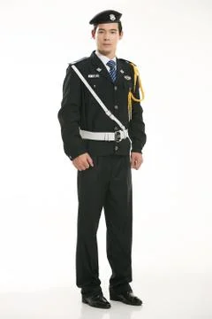 Create all kinds of work clothes policeman stands in front of a white background Stock Photos