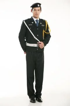 Create all kinds of work clothes policeman stands in front of a white background Stock Photos